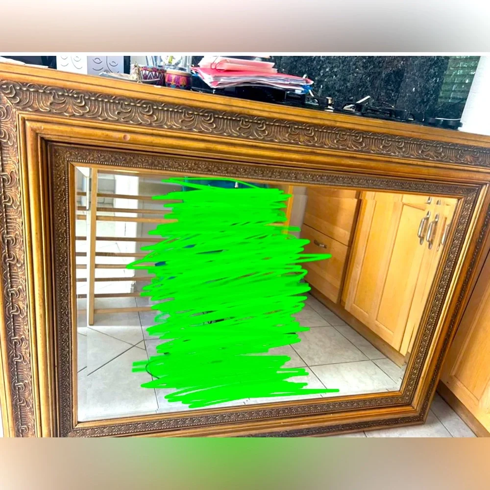 Large gold mirror